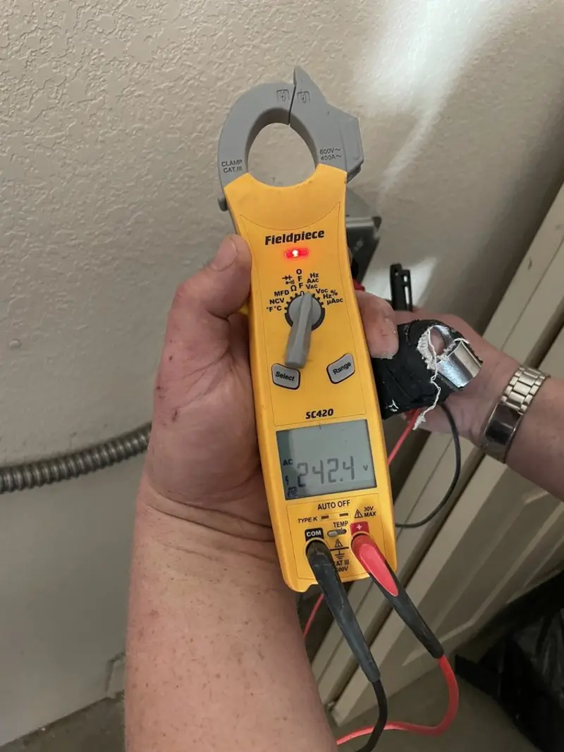 Voltage testing with clamp meter during Circuit Breaker Repair in Summit Park
